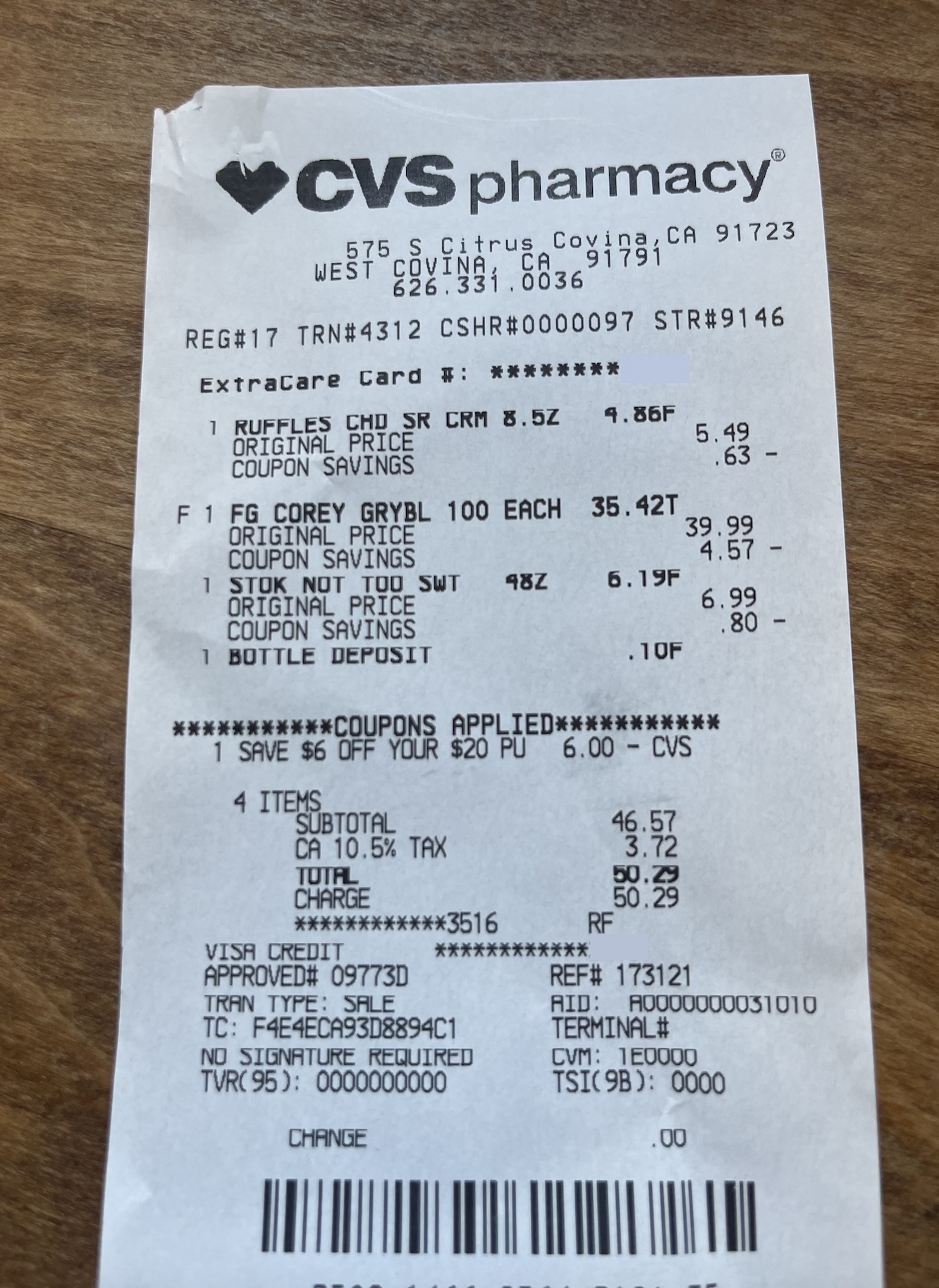 CVS receipt for a $50.29 in-store purchase of Ruffles chips, Foster Grant reading glasses, and Stok cold brew coffee.